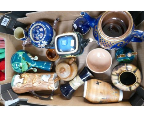 A mixed collection of ceramic items to include earthen ware vases Doulton Lambeth decorated tea pots, cottage style tea pot e