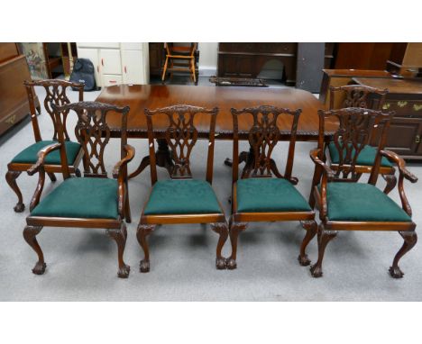 Large mahogany Chippendale style extending dining table (2.5m x 1.5m) on two carved three legged ball and claw pedestals with