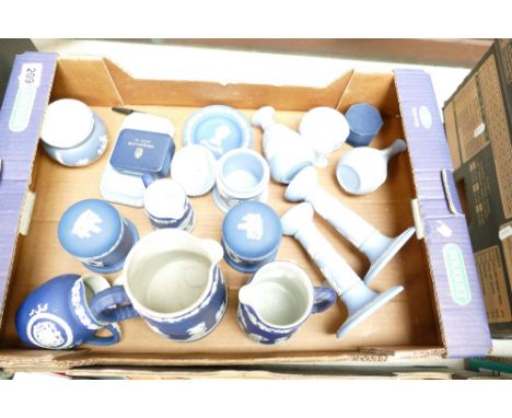 A collection of Wedgwood jasper ware in dark and light blue colouway to include candlesticks, jugs etc