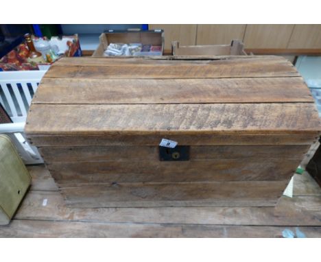 Round topped pine travel trunk complete with early toys and leather type camel figures