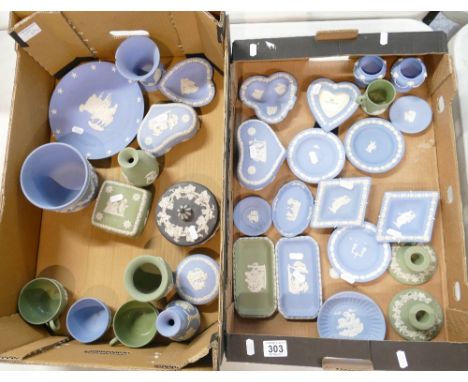 A large collection of multi coloured Wedgwood Jasperware items to include - plates, trinket bowls, pin trays, miniature cups,