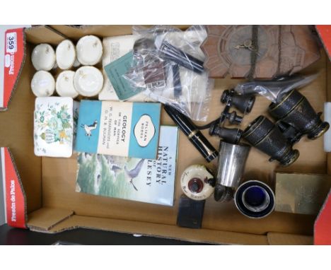 A mixed collection of items to include vintage binnoculars, small Black Forest style wall clock, oversized fountain pen, silv