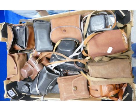 A large collection of vintage film cameras and accessories to include Zenit, Kodak, Pax, etc