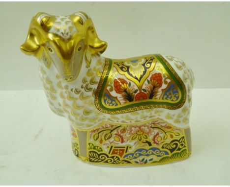 A ROYAL CROWN DERBY BONE CHINA PAPERWEIGHT, "Imari Ram", decorated and gilded in the Imari palette, with gold button, 10cm hi