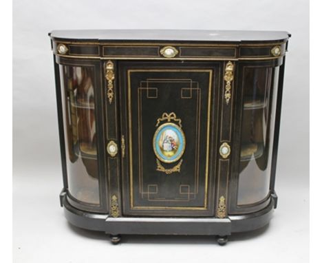 A VICTORIAN DESIGN CREDENZA having wooden ebonised effect carcass with applied cast metal mounts and ceramic effect oval plaq