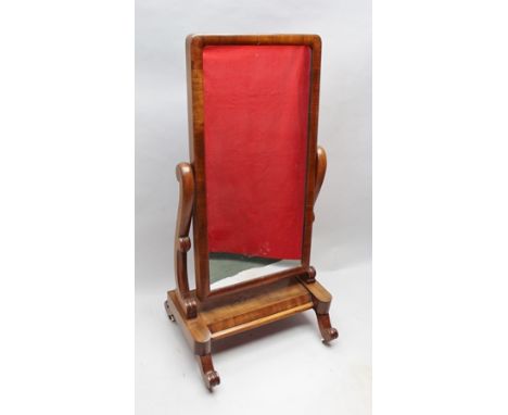 A MID VICTORIAN MAHOGANY CHEVAL GLASS on shaped uprights and plinth base, with scrolling feet with ceramic castors below, 140