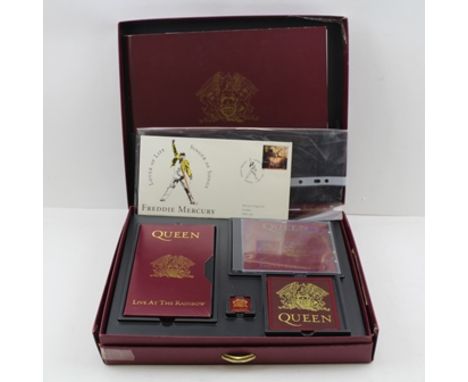 A "QUEEN" ROCK GROUP PRESENTATION BOX, Includes CD, Video "Live at the Rainbow", patch, badge, booklet and poster, box 32cm w