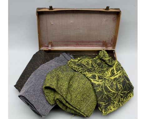 A VINTAGE SUITCASE CONTAINING A SELECTION OF ORIGINAL TIBOR REICH UPHOLSTERER'S MATERIAL, some textured, some printed 