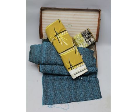A VINTAGE SUITCASE CONTAINING A SELECTION OF ORIGINAL TIBOR REICH UPHOLSTERER'S MATERIAL, some textured, some printed 