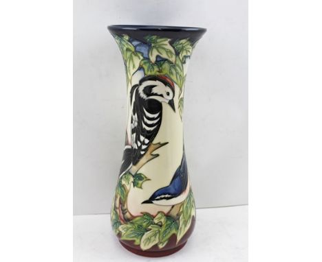 A MOORCROFT POTTERY VASE "Inglewood" pattern, tube lined and painted decoration with Woodpecker, Wren and other garden birds,