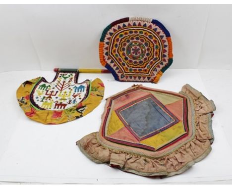 AN AXE HEAD FAN FROM GUJARAT, the blade beaded to one side, together with an axe blade fan (head only) from Gujurat, textile 