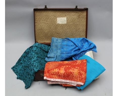 A VINTAGE SUITCASE CONTAINING A SELECTION OF ORIGINAL TIBOR REICH UPHOLSTERER'S MATERIAL, some textured, some printed 