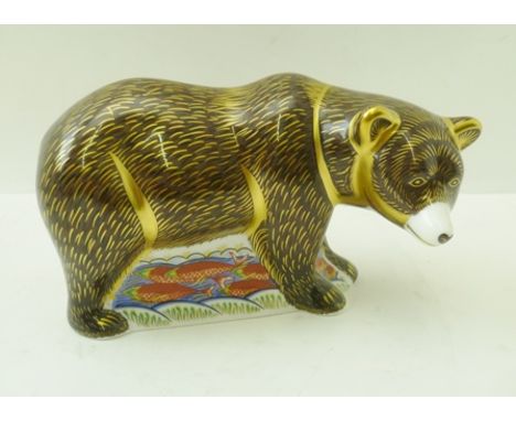 A ROYAL CROWN DERBY BONE CHINA PAPERWEIGHT, "Grizzly Bear", decorated and gilded in the Imari palette, with gold button, 9.5c