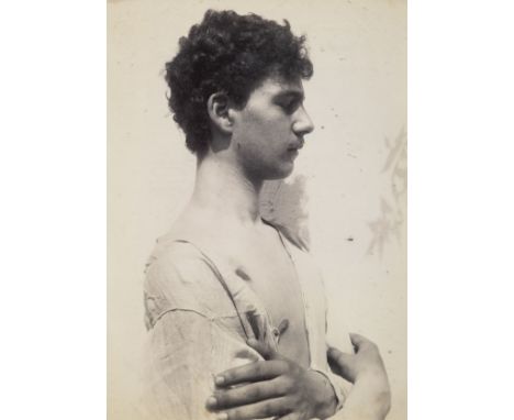 * Gloeden (Wilhelm von, 1856-1931). Head and shoulders portrait of a Sicilian peasant, circa 1900, albumen print, later ink a