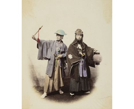 * Japan. Beato (Felice, 1832-1909). A portrait of two standing men, 1868, hand-coloured albumen print, tipped onto grey mount