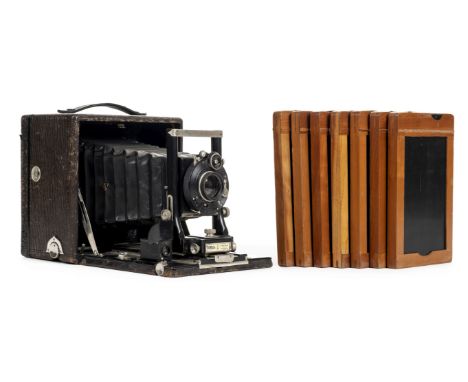 * Seneca No 9 (3A) folding plate camera and wooden tripod. Seneca No 9 (3A) folding plate camera, manufactured from 1906 to 1