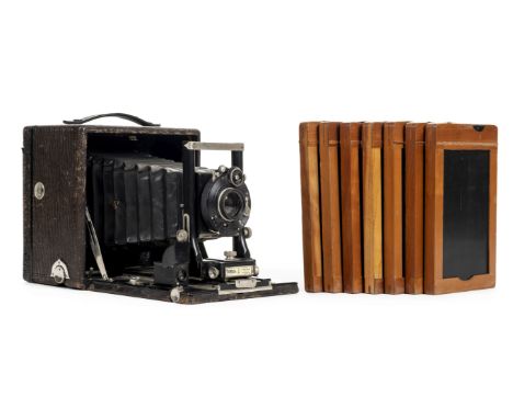 * Seneca No 9 (3A) folding plate camera and wooden tripod. Seneca No 9 (3A) folding plate camera, manufactured from 1906 to 1