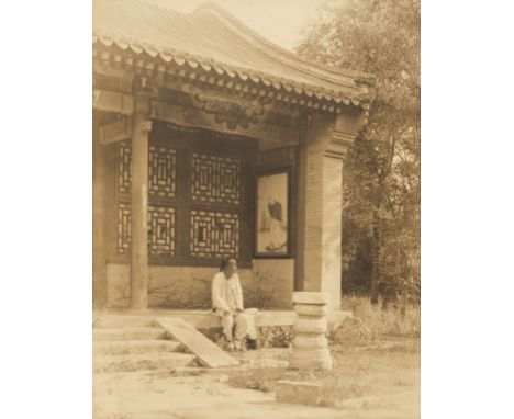* China. A man sitting in front of a Temple, attributed to Horace Jackson, circa 1900, toned gelatin silver print on thick pa