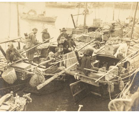* Hong Kong. A group of small boats with families along the waterfront, circa 1930s, toned gelatin silver print on card, tipp