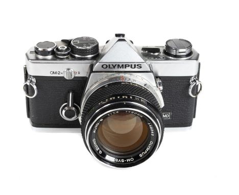 * Olympus OM2n 35mm SLR film camera. Olympus OM2n 35mm SLR film camera (Serial Number 600465) with Zuiko Auto-S 50mm f/1.4 ma