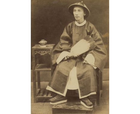 * China. Full-length portrait of a seated Chinese Mandarin, c. 1890s, albumen print on contemporary mount, closed tear to low