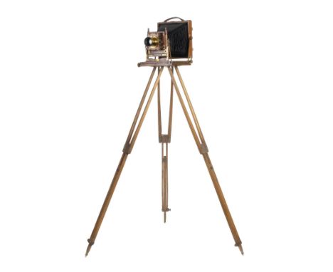 * Houghton "Triple Victo" half-plate field camera. Houghton "Triple Victo" half-plate mahogany field camera, circa 1900, with