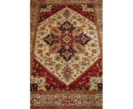 Persian Heriz design beige and red ground rug carpet, 230cm x 160cm Condition Report Click here for further images, condition