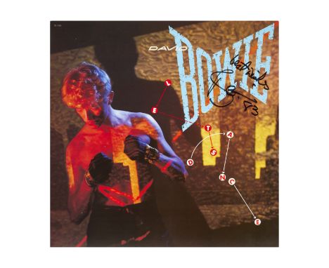 DAVID BOWIE (1947-2016)Album promotionnel autographié, Présentoir pour le titre « Let's Dance »  1983 Signé et annoté best wi