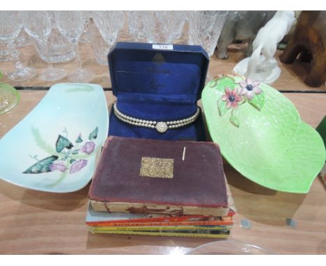 A miscellaneous selection including Ladybird books, ladies pearl necklace and two Carlton Ware dishes