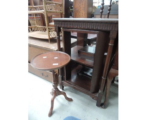 An early 20th century mahogany bookcase having central revolving section and a wine table