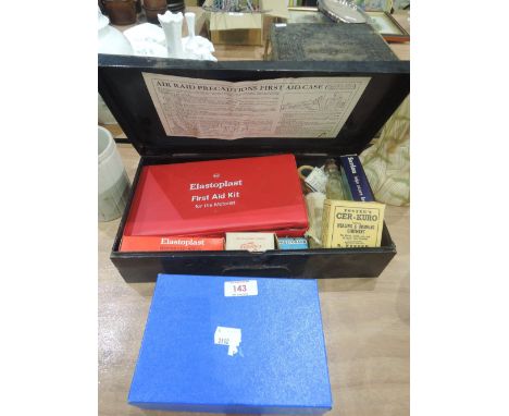 A ARP Home First Aid Kit and boxed bible
