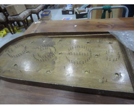 A vintage bagatelle game board