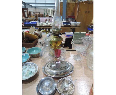 A brass oil lamp, plated ware and glass decanter etc