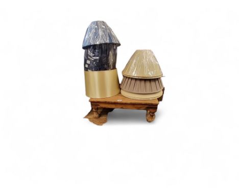 A Thacket low square coffee table, 23cm high, 63cm wide;&nbsp;&nbsp;Four black pleated Empire drum light shades, 30cm diam;&n