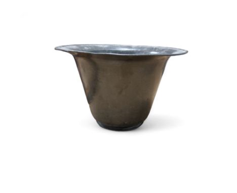 A 19th century pewter commode chamber pot, broad rim,&nbsp; tapered form, 28cm diam 