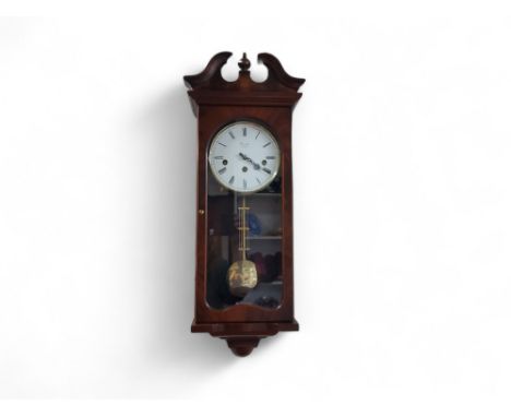 A contemporary mahogany wall clock, the white dial inscribed Committi, London, three winding holes, striking on a gong, 64cm 