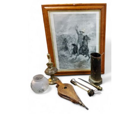 An early 20th century brass fireside set;&nbsp; bellows;&nbsp; oil lamp; Lord Baden Powell, monochrome print, maple frame, 56