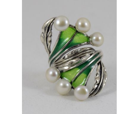 a silver plique a jour and freshwater pearl ring in the art nouveau style