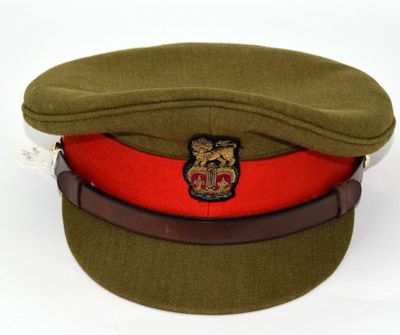 A British Army Brigadier officers peaked cap made by Herbert Johnson of