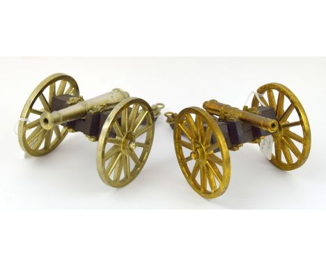 Two desk top model cannons 22cms and 20cms overall lengths
