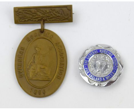 An enamel General Nursing Council badge engraved to S.R.N. O.M. Warren 1947 and an unnamed Overseas Nursing Association medal