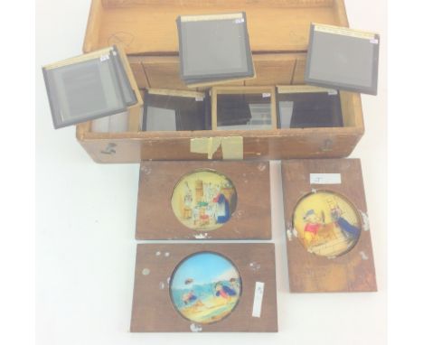 Hand painted magic lantern slides with a collection of Astro slides boxed