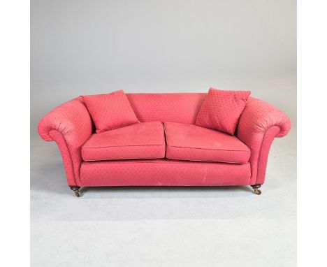 VICTORIAN CHESTERFIELD SOFA. Patterned red upholstery with ceramic castors, back leg stamped 773, 70cm H x 186cm W x 95cm D.