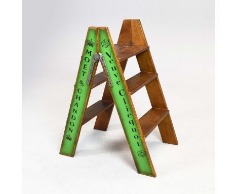 STEP LADDER. decorated with various Champagne house names,  65cm x 44cm x 80cm.