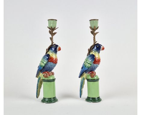 CANDLESTICKS. A pair, in the form of blue parrots, ceramic and gilt metal, 31.5cm H approx. (2).