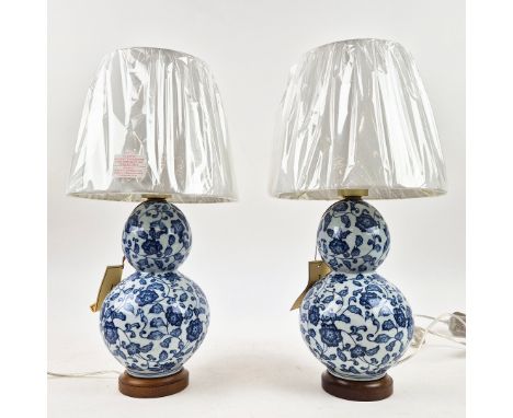 LAUREN RALPH LAUREN HOME TABLE LAMPS, A PAIR. double gourd design, blue and white glazed ceramic, with shades, 49cm H approx.