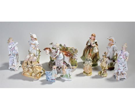 Eleven ceramic figures to include a milk maid with cow vase, figures in 18th century costume etc. tallest 24cm. (11) 