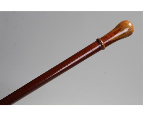 Early 20th Century turned walking stick, with an inlaid top above a turned collar and tapering staff, 92cm high