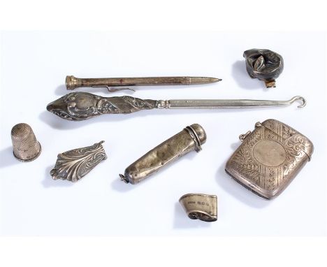 Silver objects, to include a vesta case, button hook, thimble, cigarette holder case, pencil and pieces, (qty)