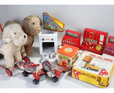 Qty of toys to include a Hercules fork lift truck, jack in a box, Codeg money till and telephone exchange, push a long dog, e